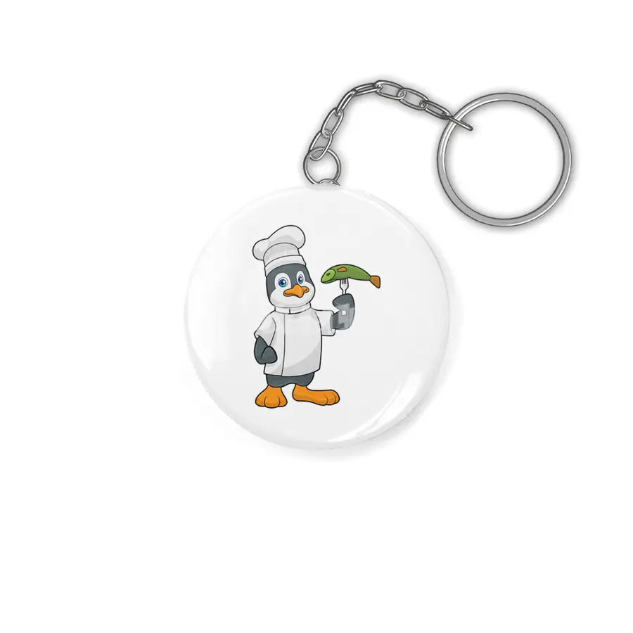 Penguin as Cook with Fish & Cooking apron Anahtarlık